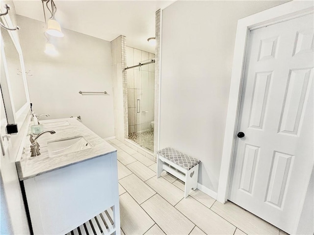 bathroom with vanity and walk in shower