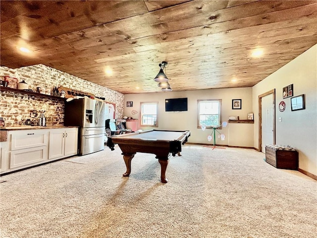 game room featuring brick wall, light carpet, wooden ceiling, and billiards