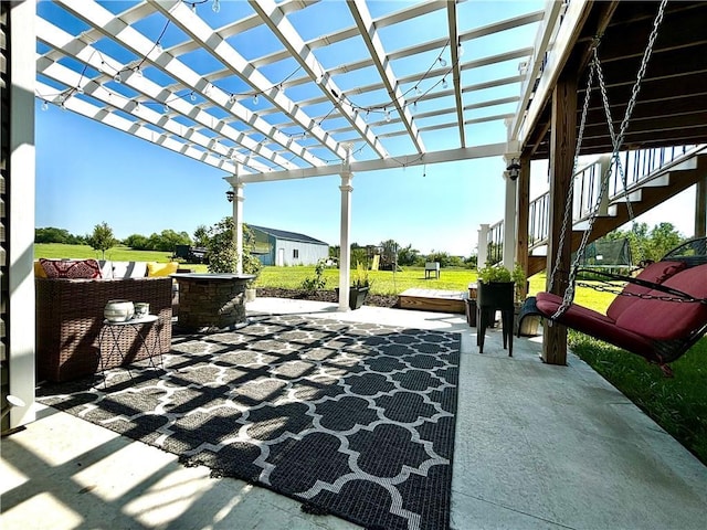 view of patio / terrace with an outdoor hangout area and a pergola