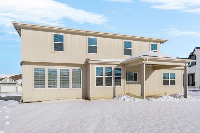 view of snow covered property