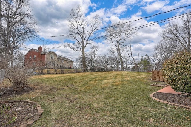 view of yard with fence