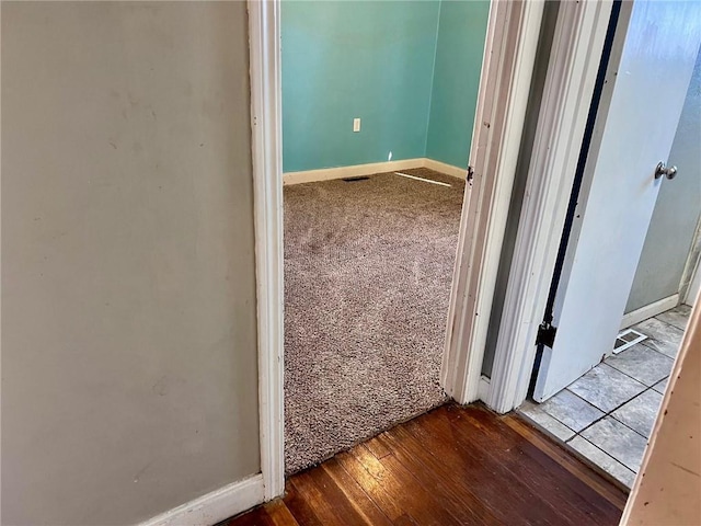 hall featuring wood-type flooring