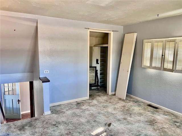 unfurnished bedroom featuring carpet floors