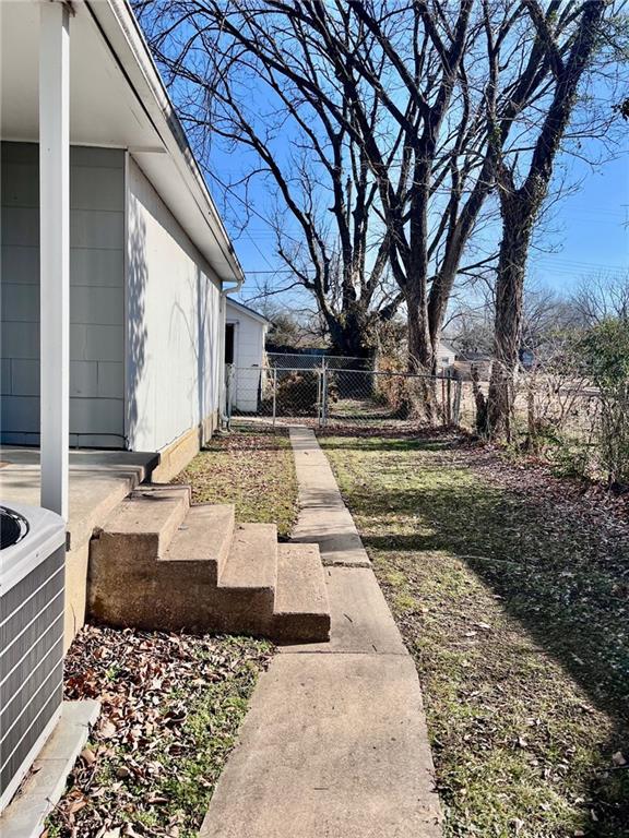 view of yard featuring central AC unit