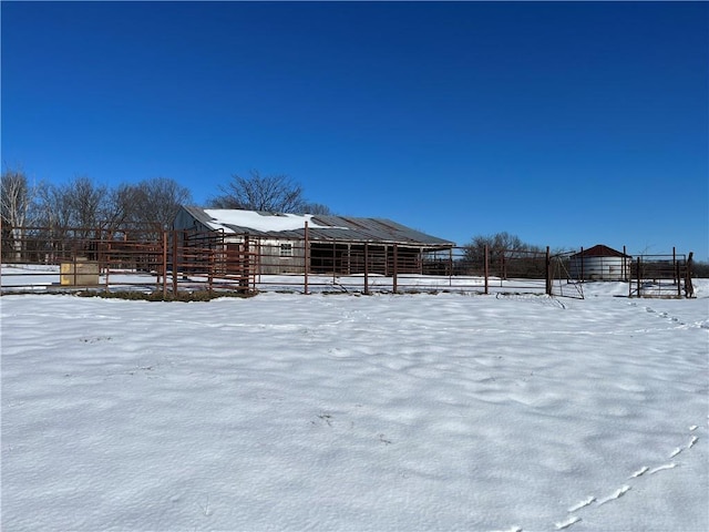 view of yard layered in snow