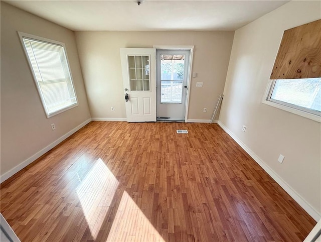 foyer entrance featuring light hardwood / wood-style flooring