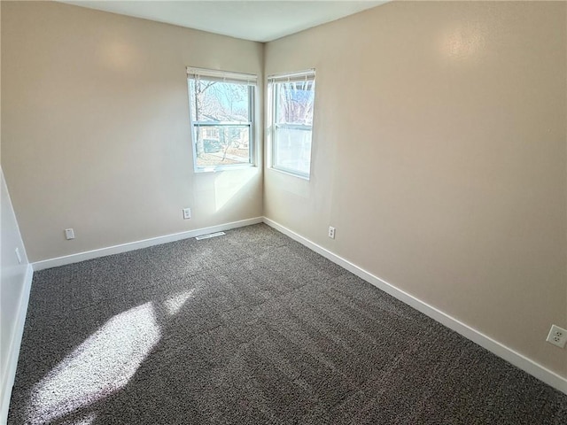 empty room featuring carpet