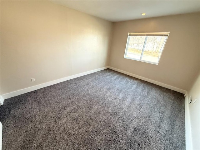 unfurnished room featuring carpet floors