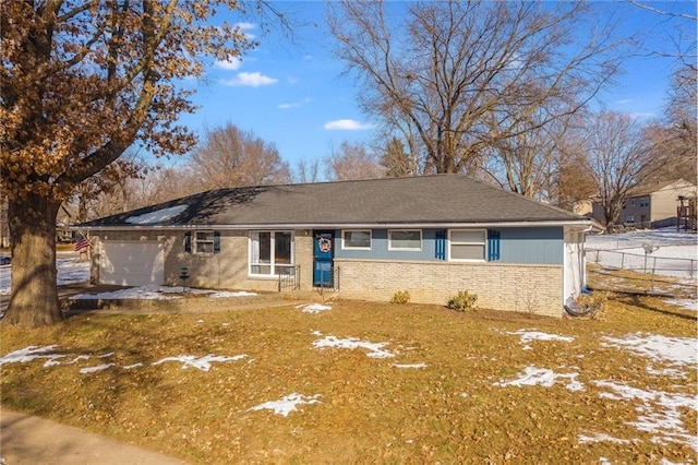 single story home featuring a garage