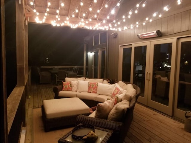 interior space with french doors and hardwood / wood-style floors