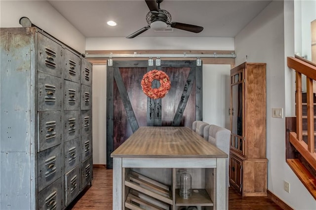 wine room featuring recessed lighting, wood finished floors, a ceiling fan, and baseboards