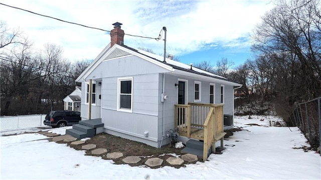 view of snow covered property