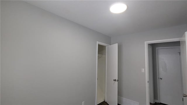 unfurnished bedroom featuring a closet