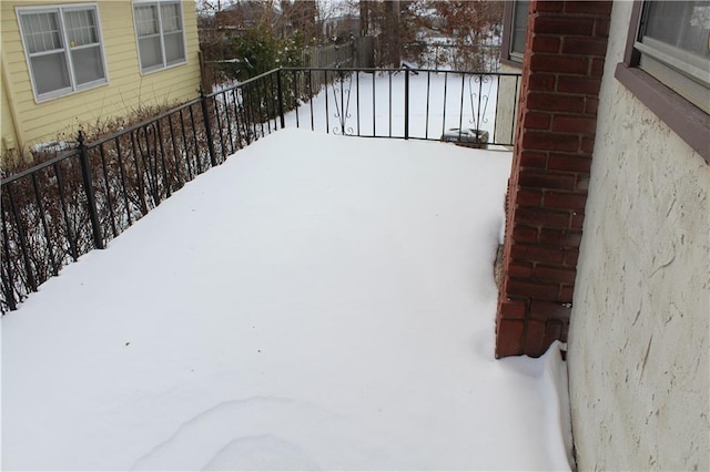 view of snow covered deck