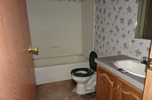 full bathroom with vanity, toilet, and shower / washtub combination