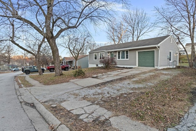 ranch-style house featuring a garage