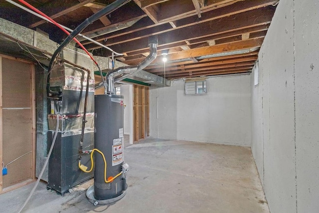 basement with heating unit and gas water heater