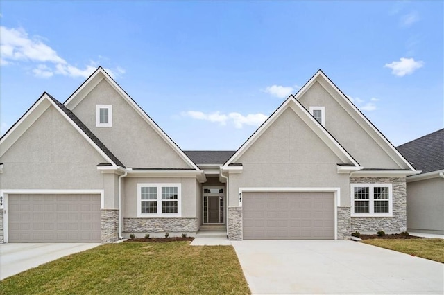 view of front of house featuring a garage and a front yard