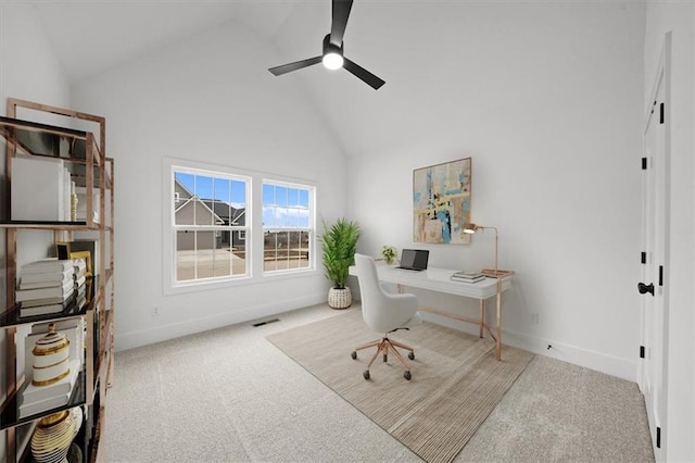 office area with ceiling fan, light colored carpet, and high vaulted ceiling