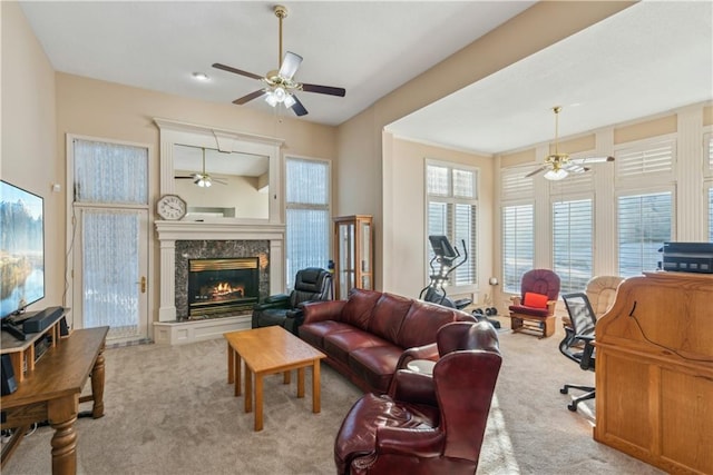 carpeted living room with a fireplace