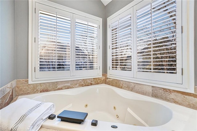 bathroom with a tub