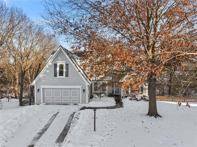 view of front of property with a garage