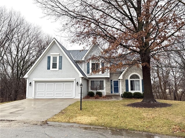 view of front of house featuring driveway, stone siding, a front lawn, and stucco siding