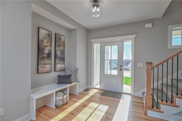 entryway with light hardwood / wood-style flooring