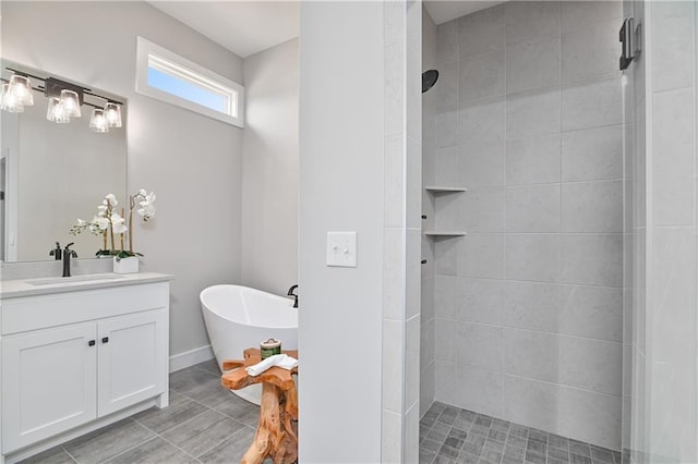 bathroom featuring vanity and shower with separate bathtub