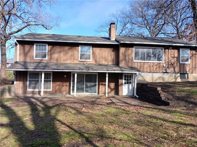 rear view of property featuring a patio area