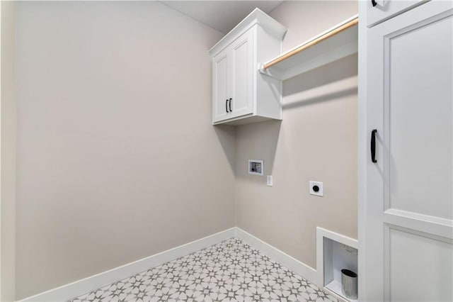 laundry room featuring hookup for a washing machine, hookup for an electric dryer, and cabinets