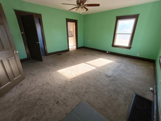 unfurnished bedroom with carpet flooring and ceiling fan