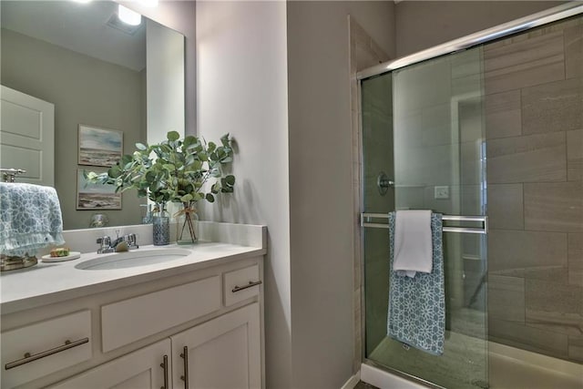 bathroom featuring vanity and walk in shower