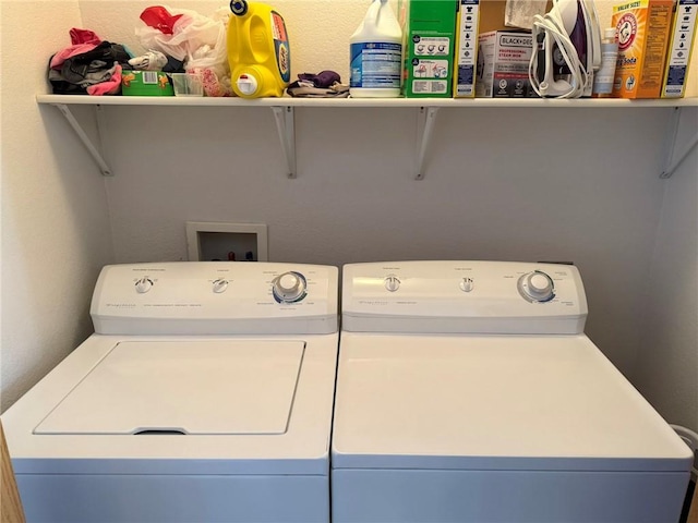 washroom with separate washer and dryer