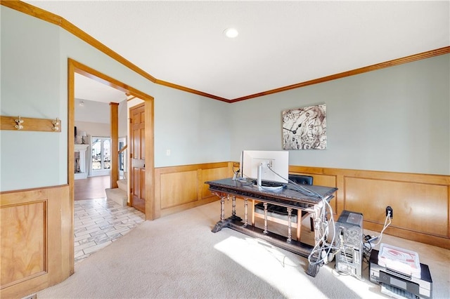 office area with crown molding, carpet flooring, and wainscoting