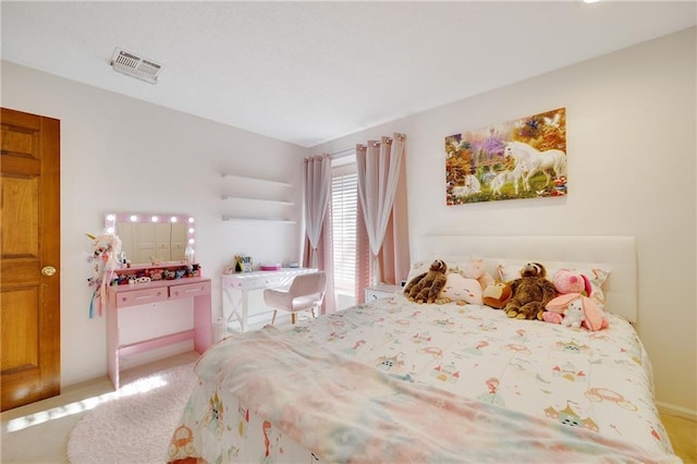 bedroom with light carpet and visible vents