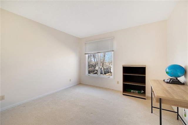 carpeted office with baseboards