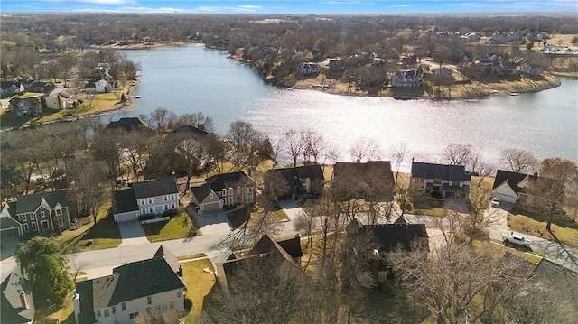 birds eye view of property featuring a residential view and a water view