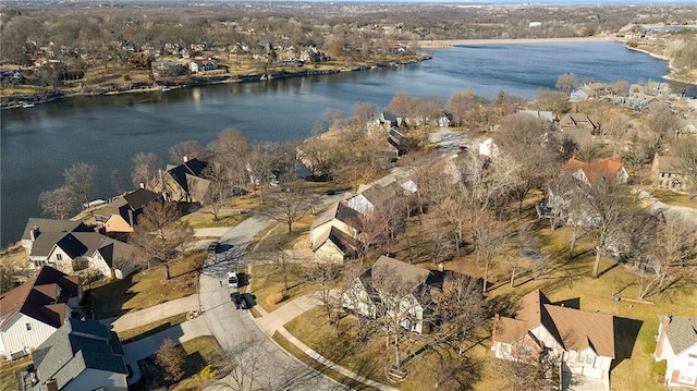 aerial view featuring a water view and a residential view