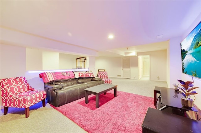 living room featuring carpet flooring and recessed lighting