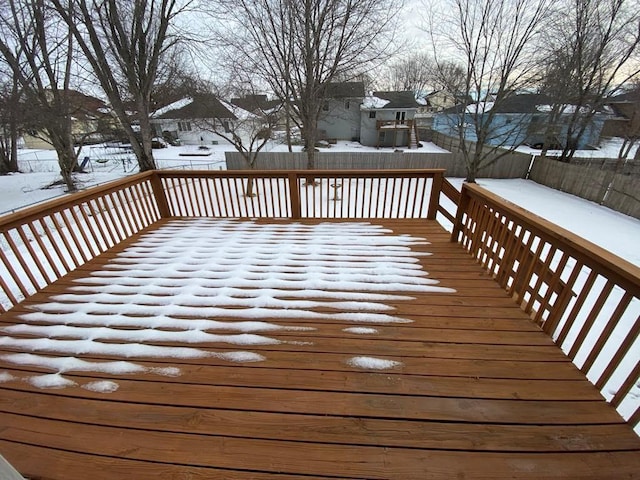 view of snow covered deck