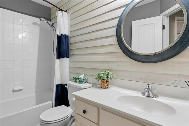 full bathroom featuring toilet, shower / tub combo, and vanity