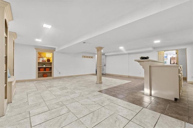 finished basement with recessed lighting, built in features, and baseboards