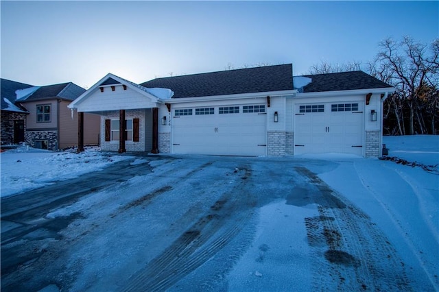 single story home with a garage