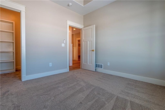 unfurnished bedroom featuring carpet floors