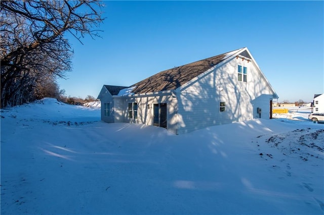 view of snow covered property