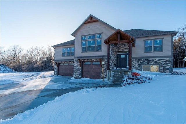 craftsman-style home featuring a garage