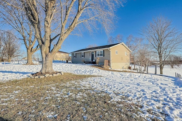 view of snow covered property