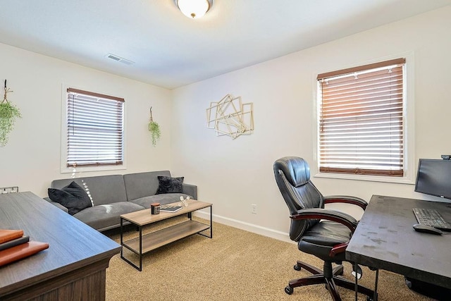 home office featuring light carpet