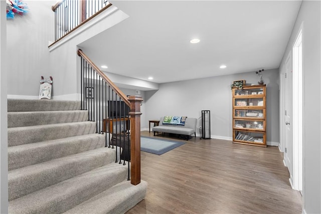 25215 W 141st Ter, Olathe, KS 66061 - staircase featuring recessed lighting, wood finished floors, and baseboards